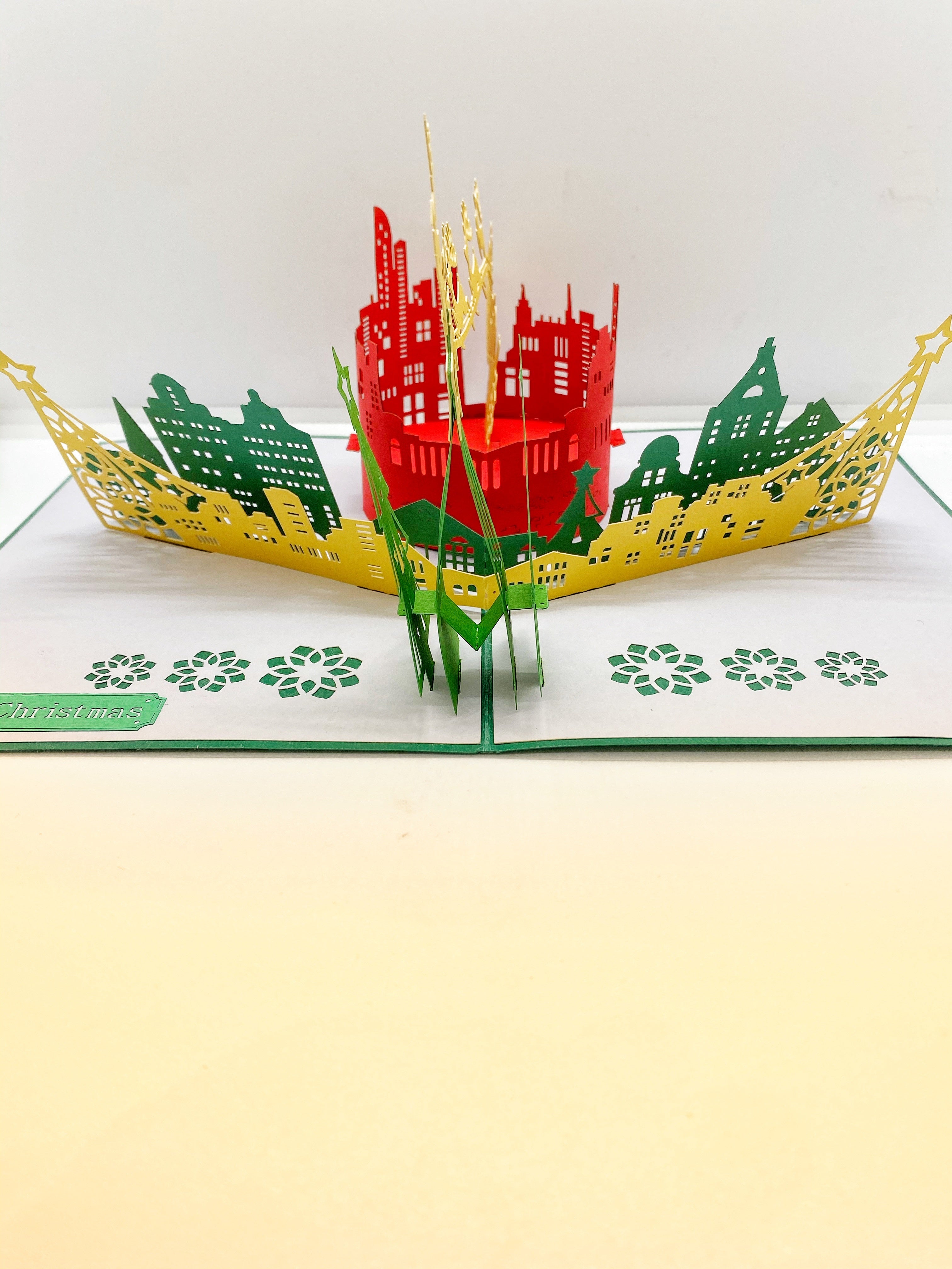 Pop-up Card _ Santa and His Reindeers Flying Over City